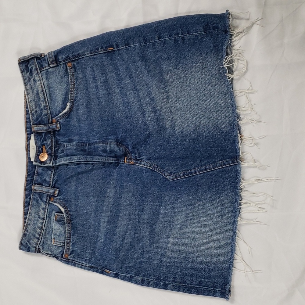 Raw/distressed hem denim skirt